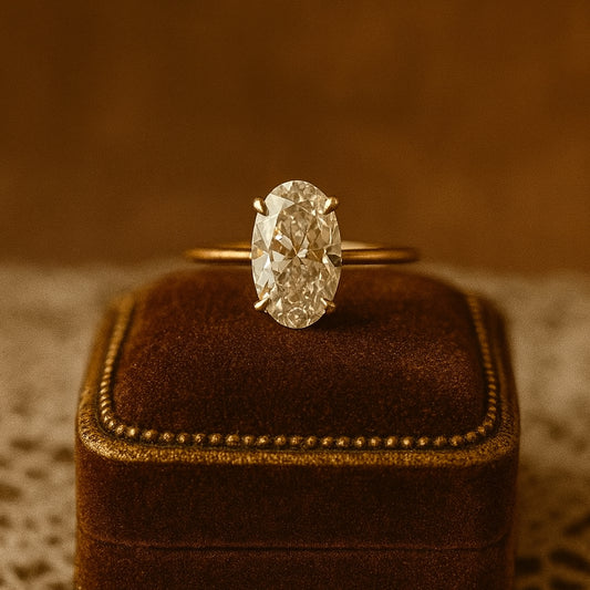 Classic Female Engagement Ring With Oval Moissanite Stone Offering Brilliant Fire And Clarity In Minimalist Gold Setting