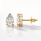 Pear Shaped Diamond Earrings V Prong And Claw Prong Setting Yellow Gold Earrings.
