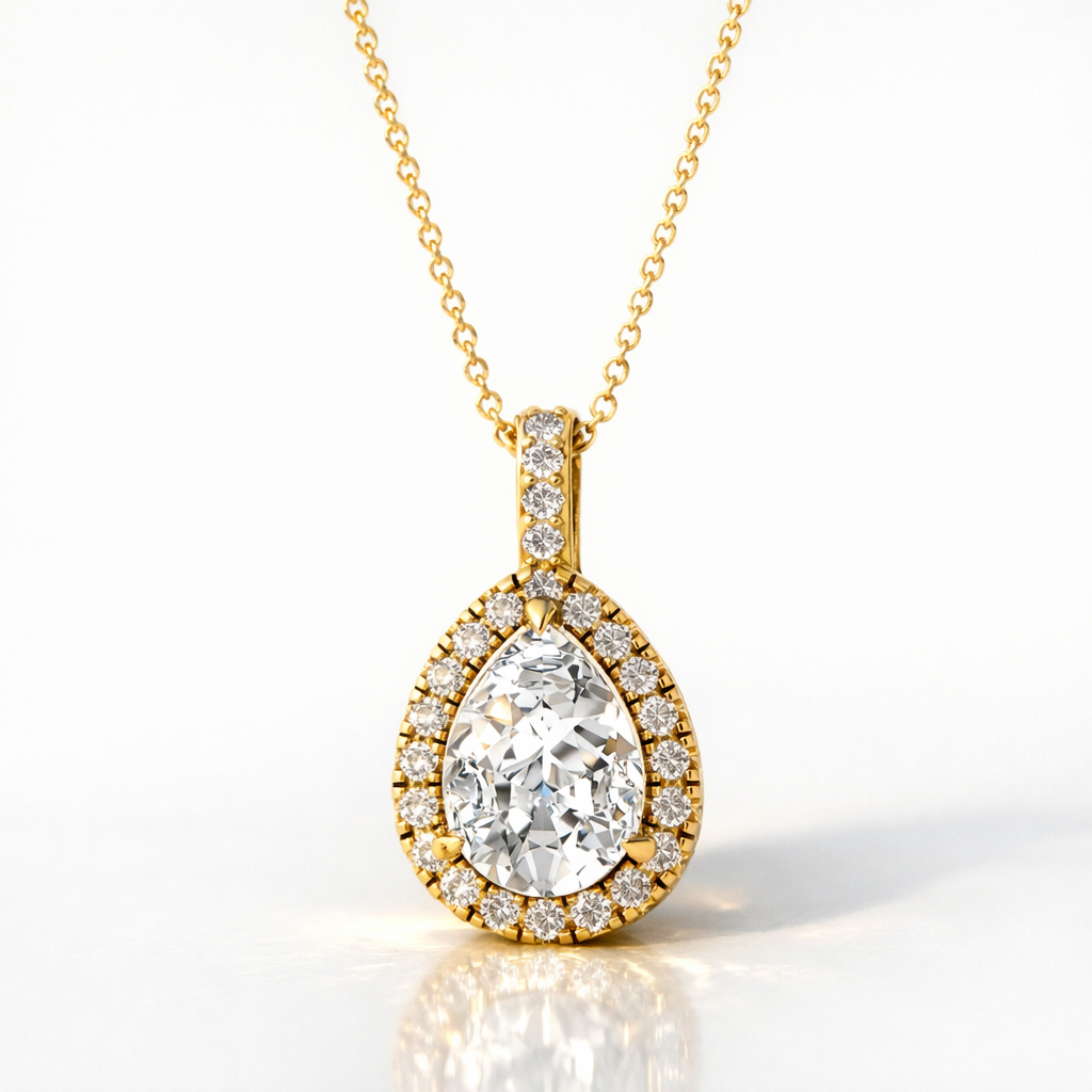 Pear-Shaped Moissanite Pendant With A Round-Cut Halo In Yellow Gold.
