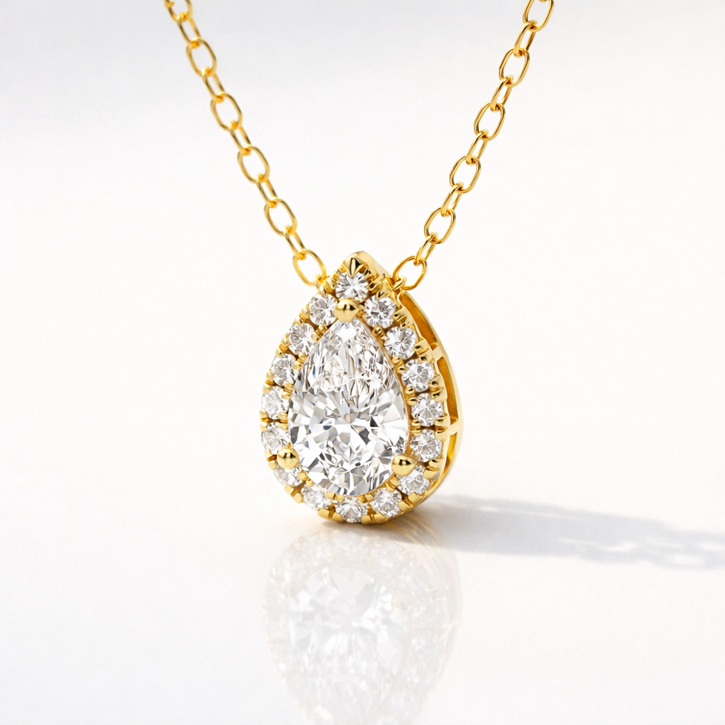 Moissanite Pear Halo Pendant In Yellow Gold Setting
