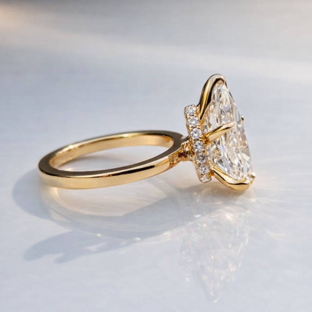 Pear Shaped Diamond Ring Featuring Hidden Halo Engagement Ring Design
