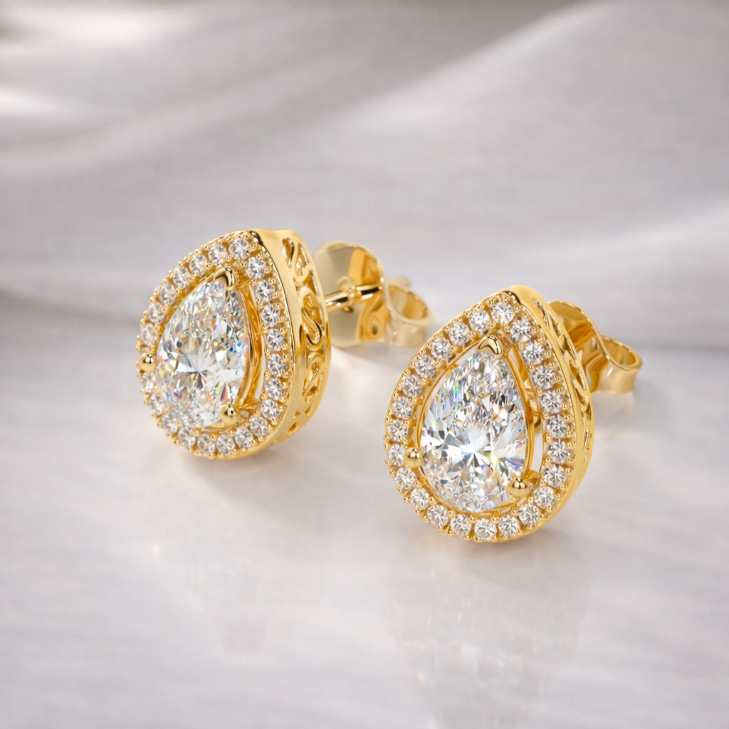 Pear Shaped Diamond Stud Earrings In Yellow Gold
