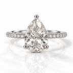 Pear cut diamond center stone in a three-prong rose gold setting with a pavé diamond band