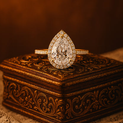 18K Yellow Gold Pear Cut Moissanite Bridal Ring With Halo And Pave Detailing Offering Elegant Diamond Alternative Beauty