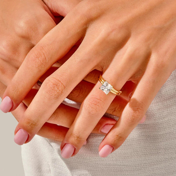 Four claw prong princess cut solitaire engagement ring

