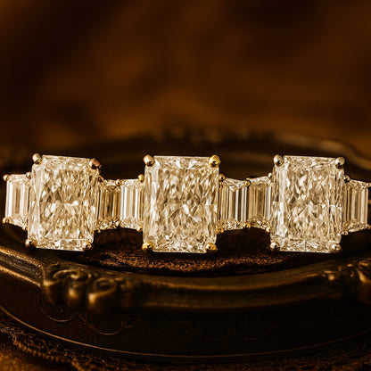 Luxury Radiant Cut Diamond Engagement Ring With Tapered Baguette Side Stones In Yellow Gold Setting