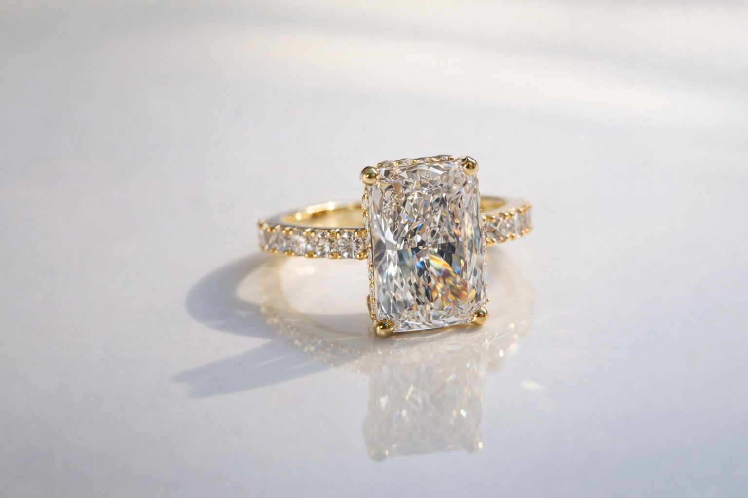Yellow Gold Engagement Ring Featuring Radiant Cut Moissanite And Hidden Halo

