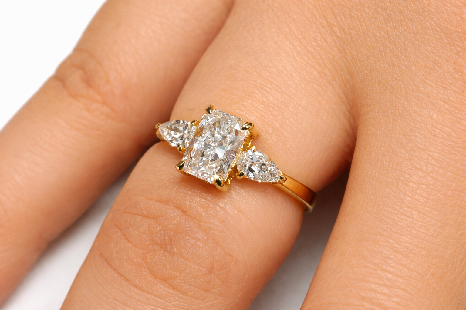 Radiant Cut Moissanite Engagement Ring 2 Pear Cut Side Stone Diiro.
