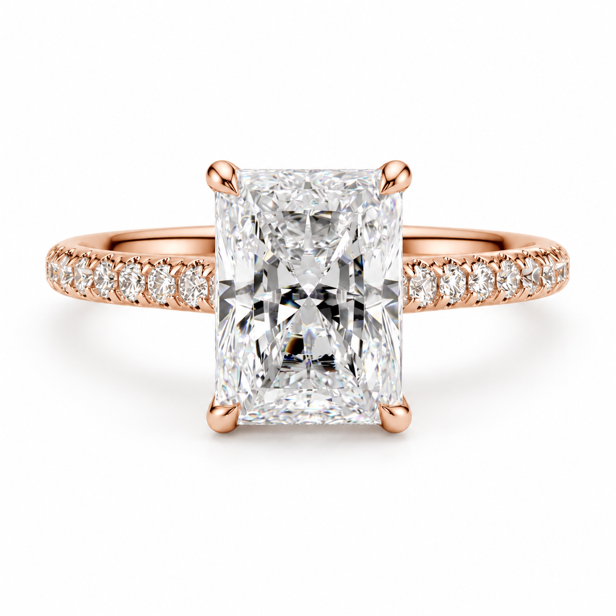 Rose gold radiant cut diamond solitaire engagement ring featuring a large center diamond, polished 18K rose gold band, and sparkling pavé accents for weddings and proposals