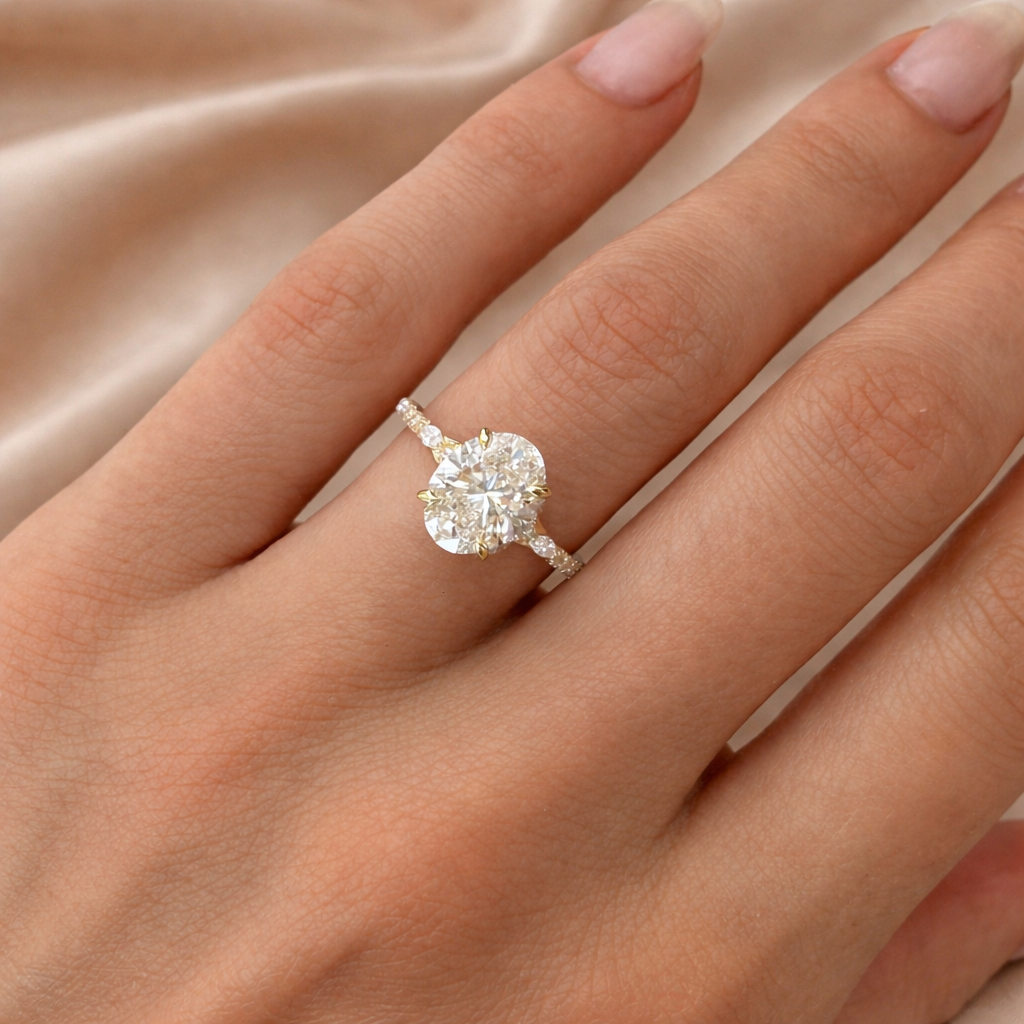 2 Carat Oval Diamond Ring With Round And Marquise Side Stones
