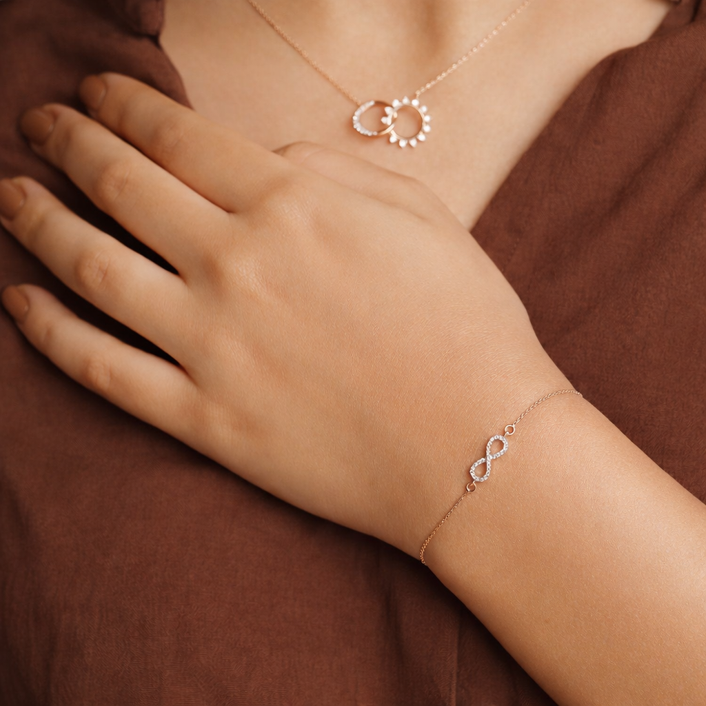 Gold infinity bracelet for women
