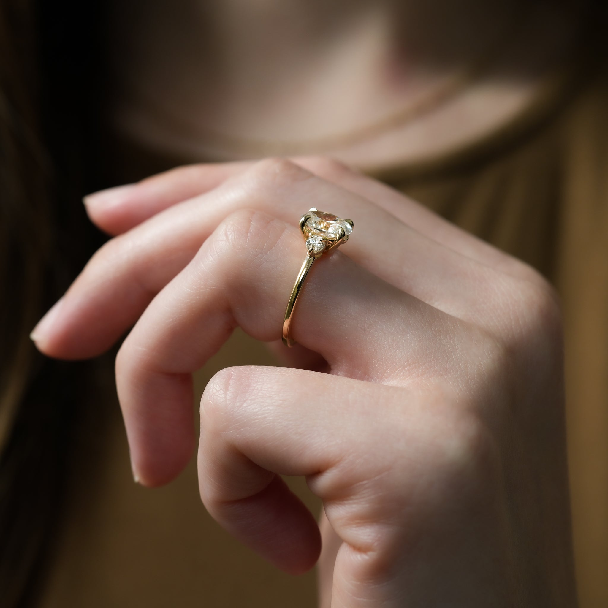 Diamond Ring Three Stone Setting Featuring A Four Claw Prong Design.
