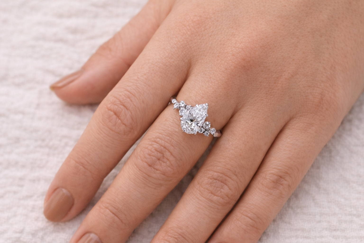 Pear And Round Cut Side Stone Moissanite Engagement Ring Diiro.

