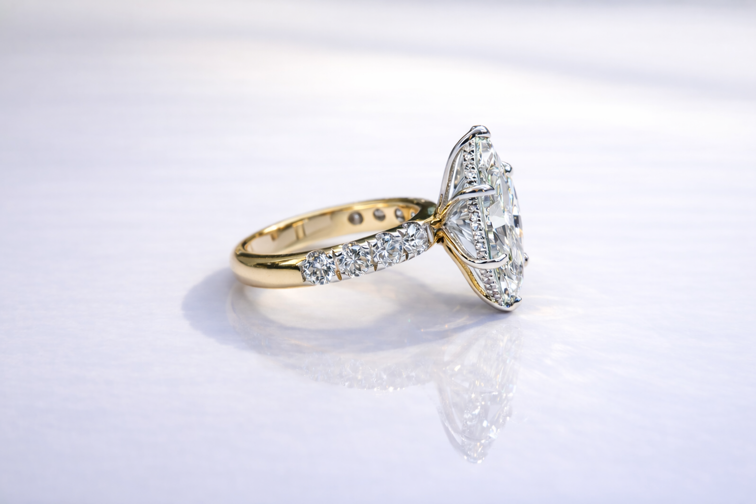 Hidden Halo Engagement Ring With Marquise Cut Diamond And Two Metal Design
