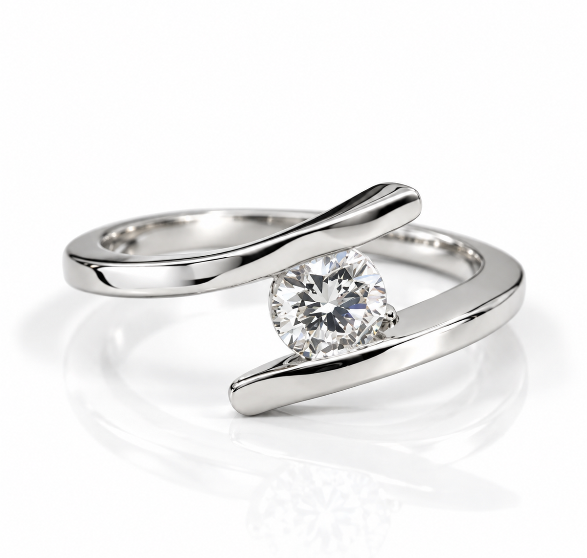 Polished silver bypass ring with a round brilliant-cut gemstone and elegant twisted band