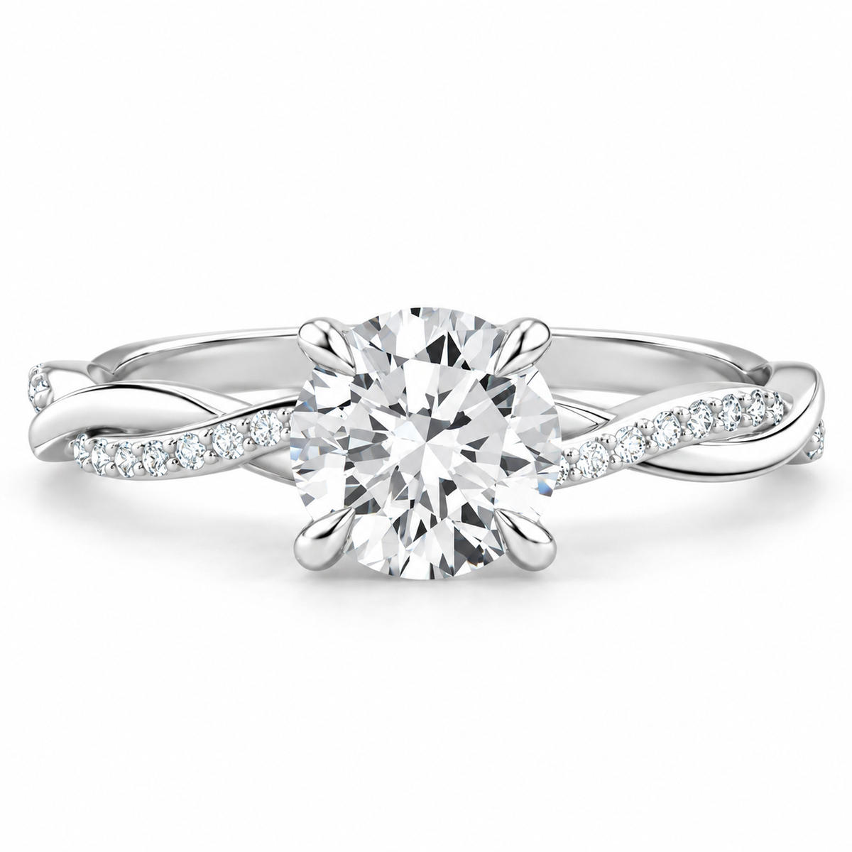 Round brilliant cut diamond engagement ring in polished silver with a twisted infinity band and pavé diamond accents along the shoulders.