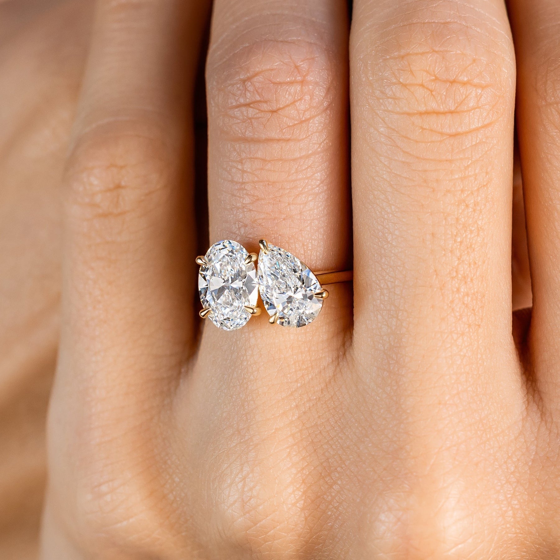 Pear And Marquise Cut Moissanite Toi Et Moi Ring Yellow Gold Setting.
