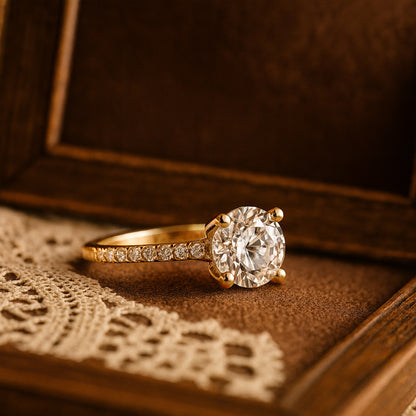 Yellow Gold Solitaire Engagement Ring With Round Brilliant Diamond and Pavé Diamond Band
