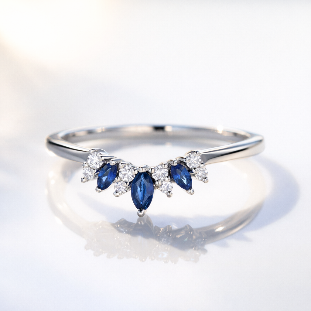 Curved Blue Sapphire Diamond Wedding Band In White Gold
