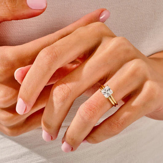 Princess cut diamond ring with matching diamond band
