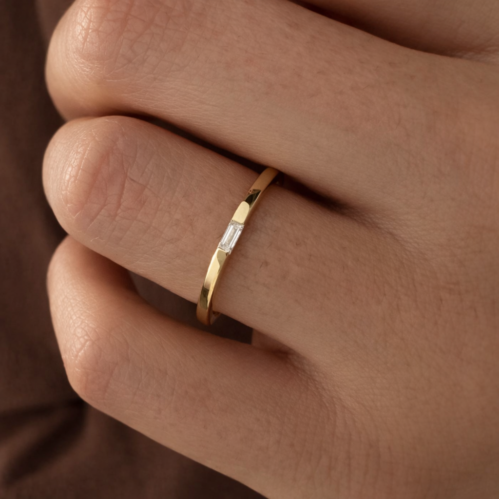 Delicate Baguette Cut Moissanite Wedding Band In Gold
