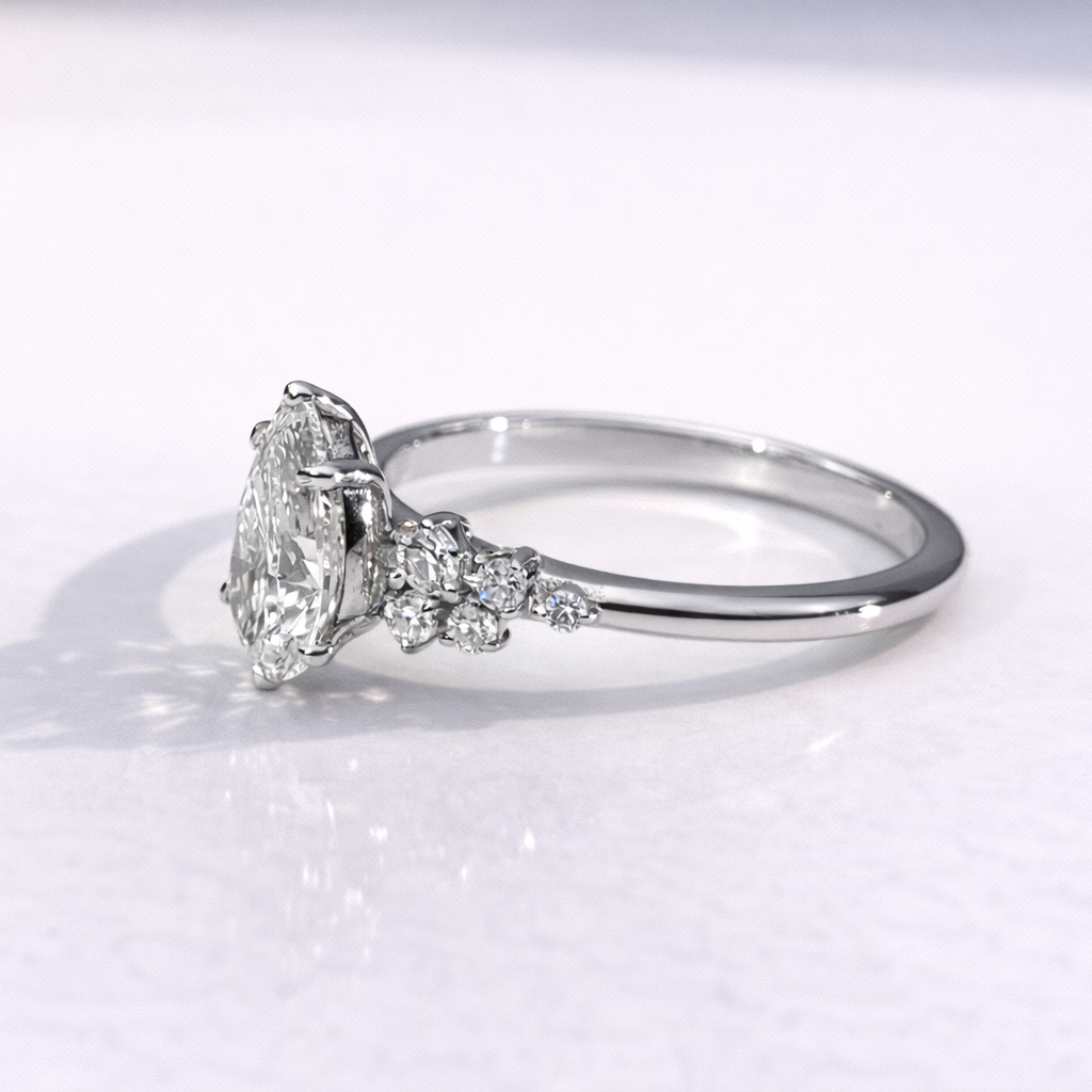 Pear Cut Diamond Ring 6 Claw Prong Setting Side Stone Engagement Ring.
