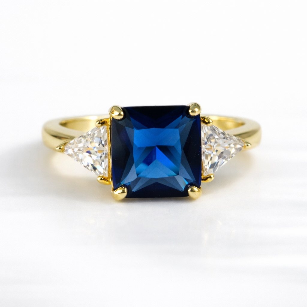 Three Stone Sapphire Ring Princess Cut Engagement Ring Trillion Side Stones.
