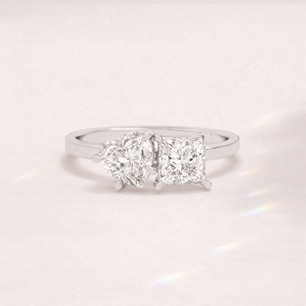 White Gold Toi Et Moi Engagement Ring, Heart And Princess Cut, Claw Prong.
