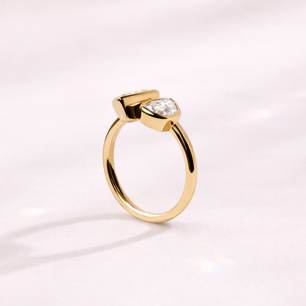 Toi Et Moi Moissanite Ring With Two Pear Cut Diamond Bezel Setting.
