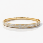 Triple row diamond bracelet in gold
