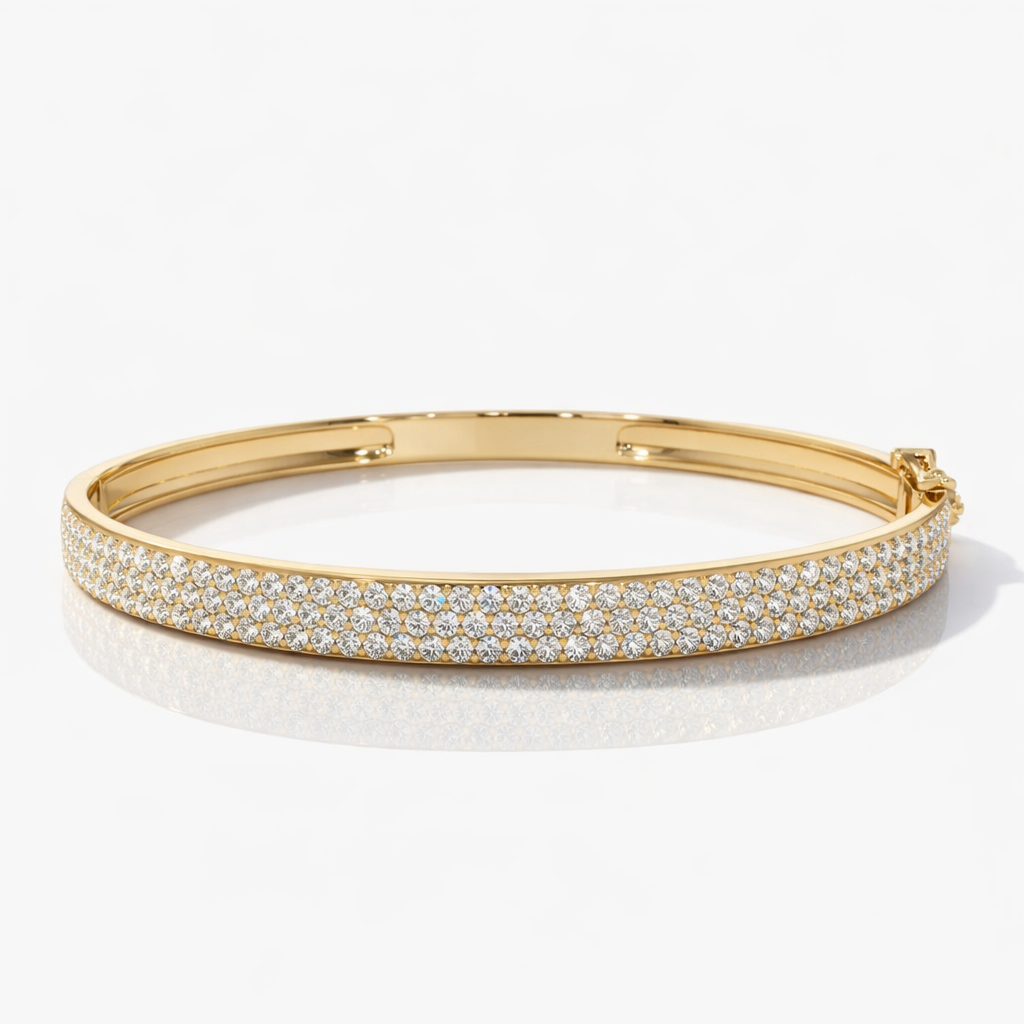 Triple row diamond bracelet in gold
