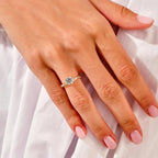 Rose gold twisted engagement ring with wedding band
