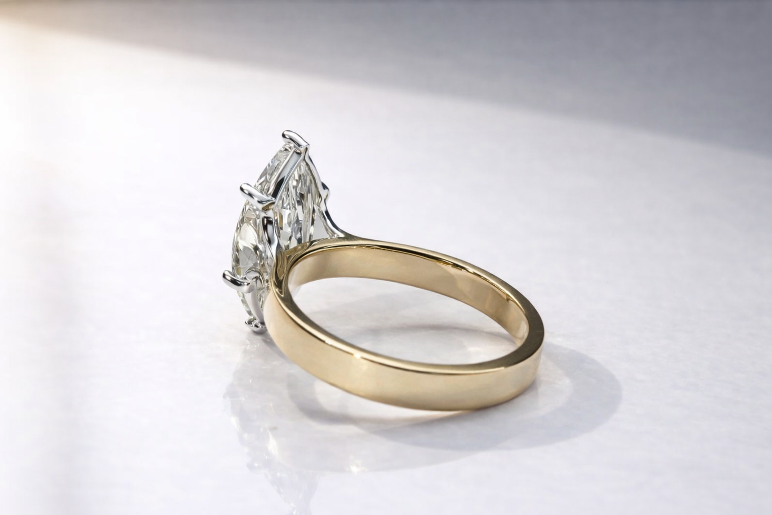 Two Metal Ring With Marquise Solitaire Diamond In Yellow And White Gold
