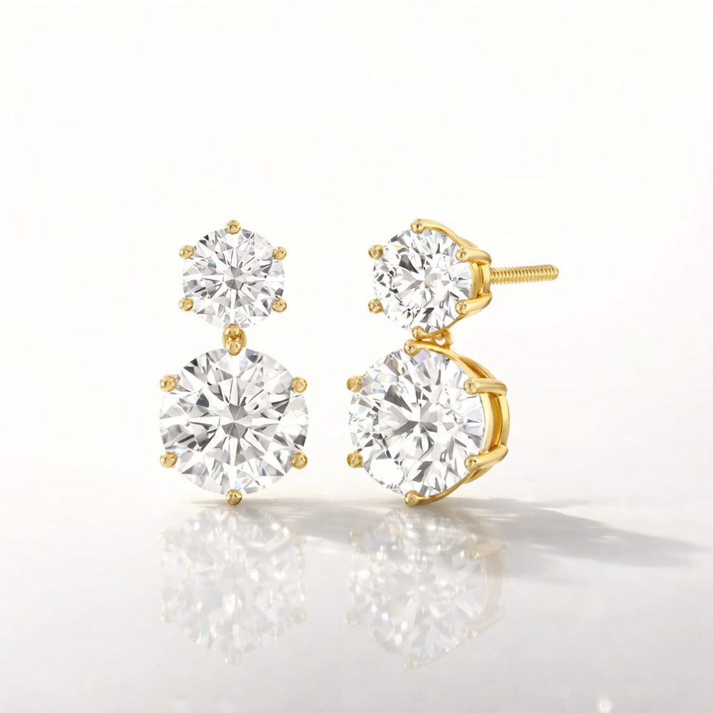 Chic Two Stone Diamond Earrings With Round Diamonds In Gold Settings
