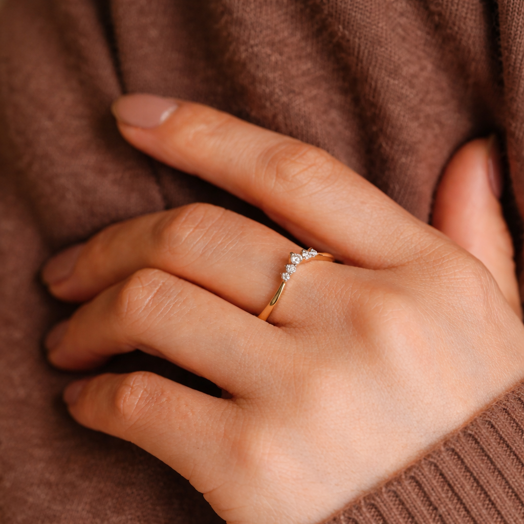 Curved V Shaped Wedding Band With Round Cut Diamond Accents
