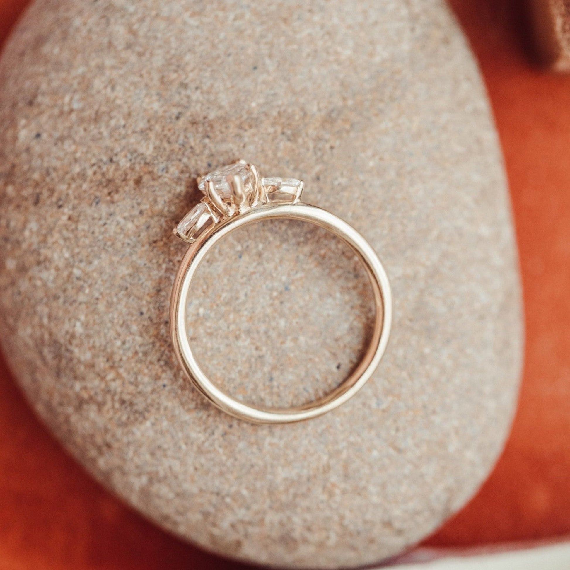 Pear Cut Moissanite Engagement Ring, Three Stone Bridal Wedding Jewelry With Yellow Gold And Symbolism