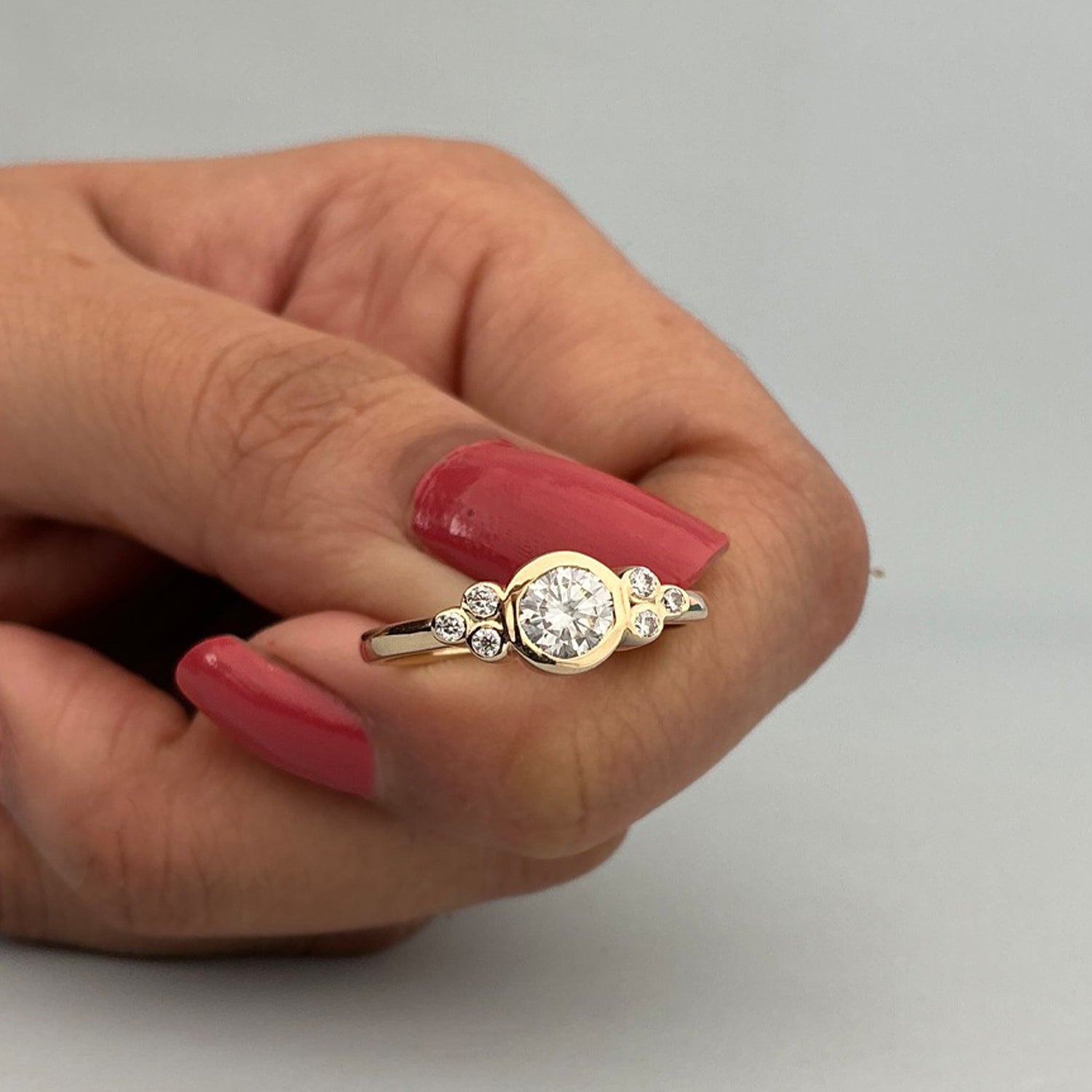 Round Cut Moissanite Engagement Ring With Square Prong Setting And Ribbed Band In White Gold