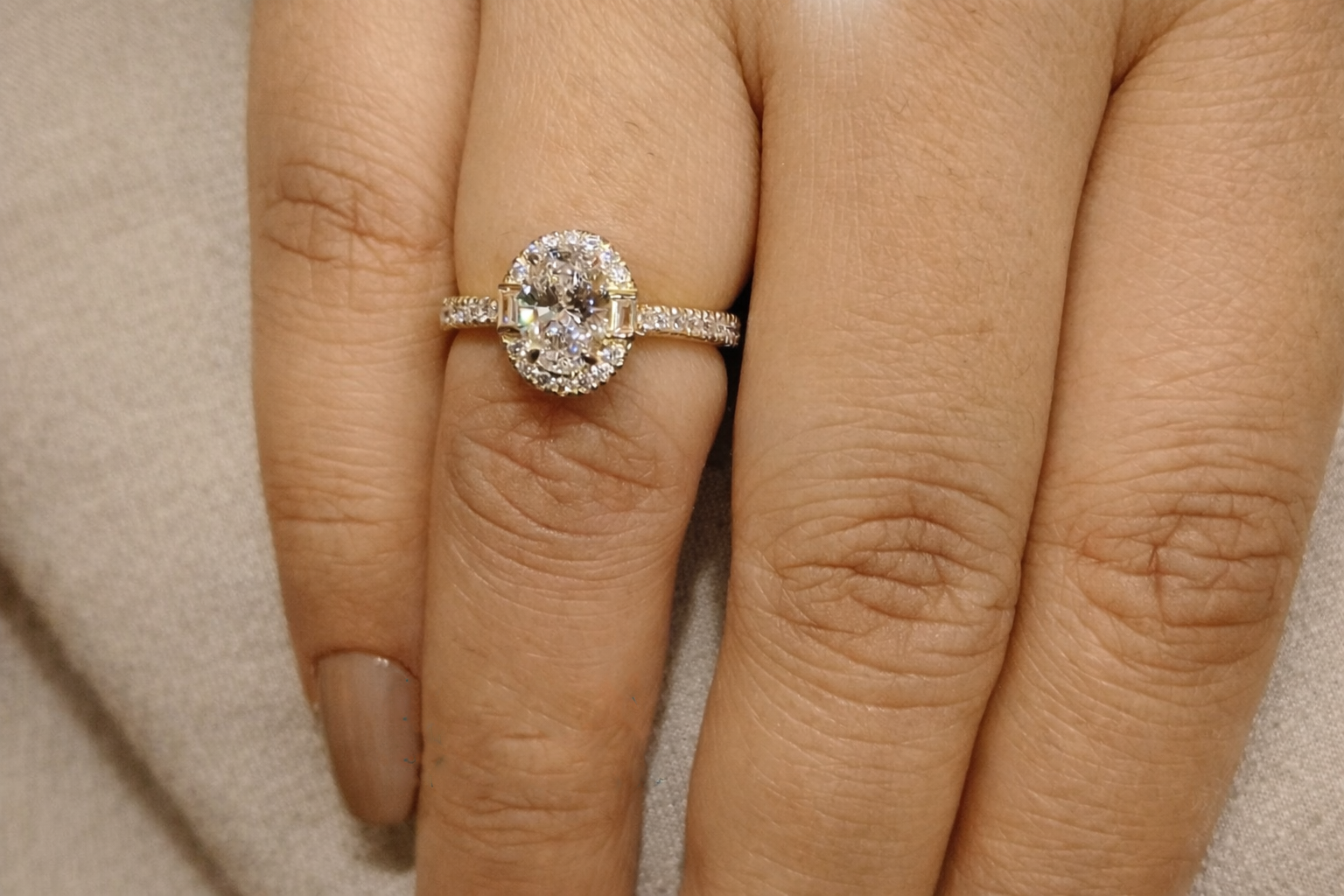 Yellow Gold Engagement Ring With Oval Halo And Round Cut Pave Band
