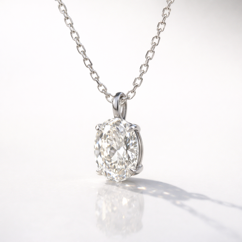Timeless Oval Moissanite Pendant In Gold With A 4-Prong Claw Setting.