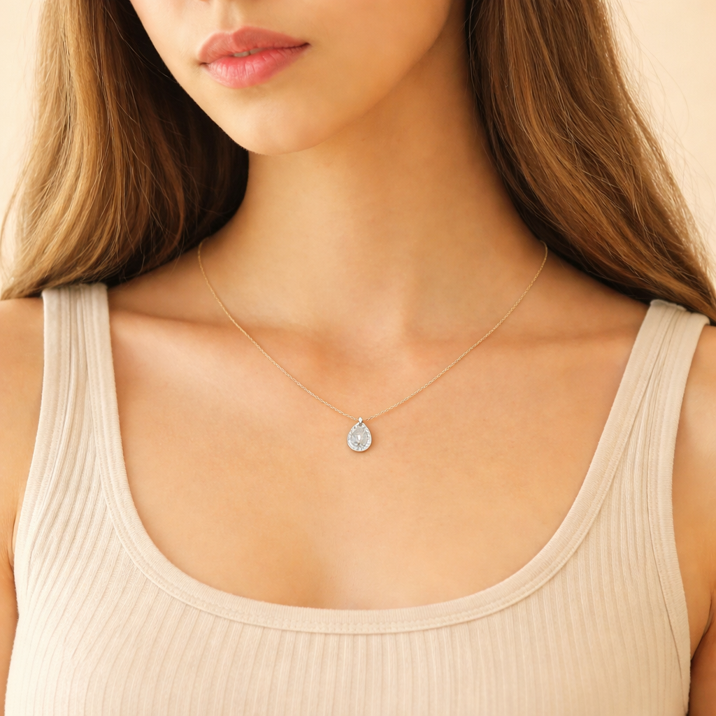 Pear Shaped Pendant With Round Cut Halo In Yellow Gold
