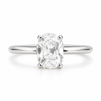 Elegant oval cut moissanite engagement ring in high-quality polished silver with a classic four prong setting and sleek solitaire band.