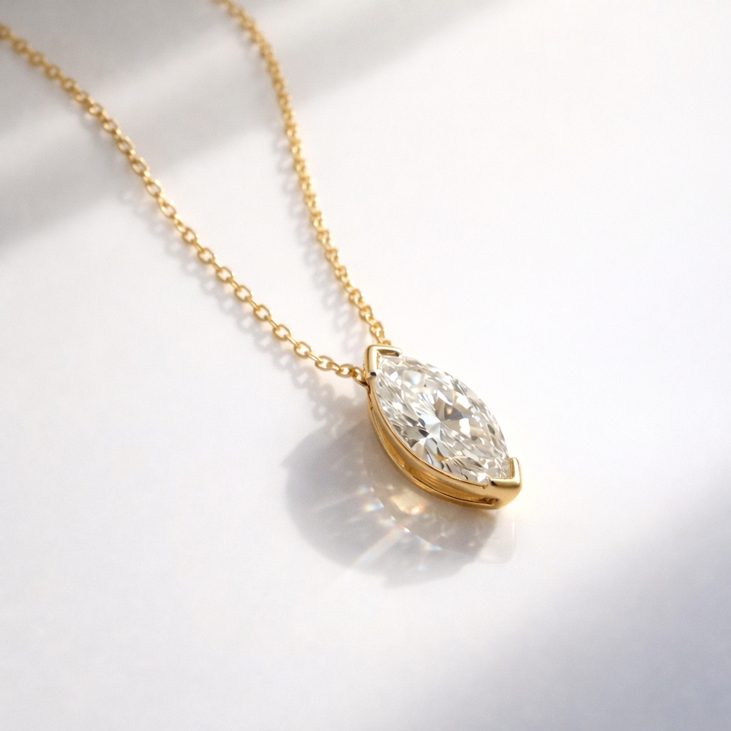 14K Gold Cross Pendant Featuring A Round-Cut Diamond In A 4-Prong Setting.
