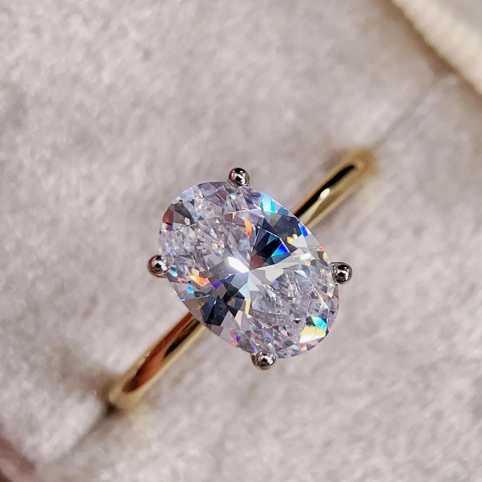 Minimalist Oval Cut Solitaire Engagement Ring With Four Prong Yellow Gold Setting