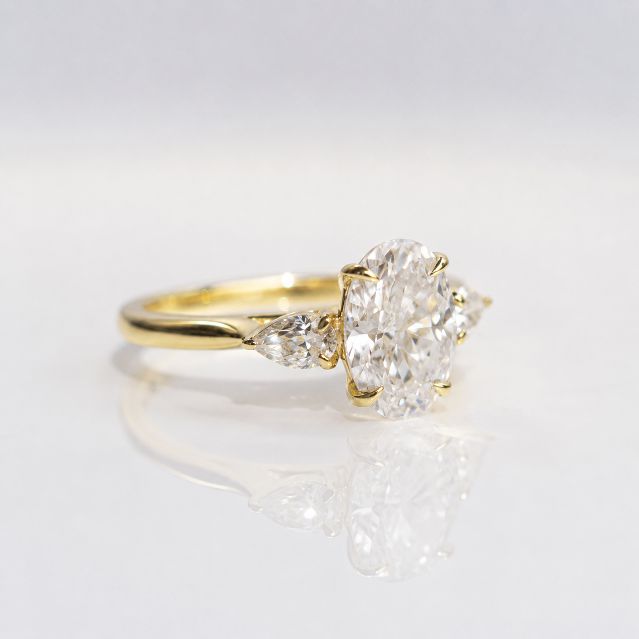 Three Diamond Engagement Ring Pear Side Stone Engagement Ring Diiro.
