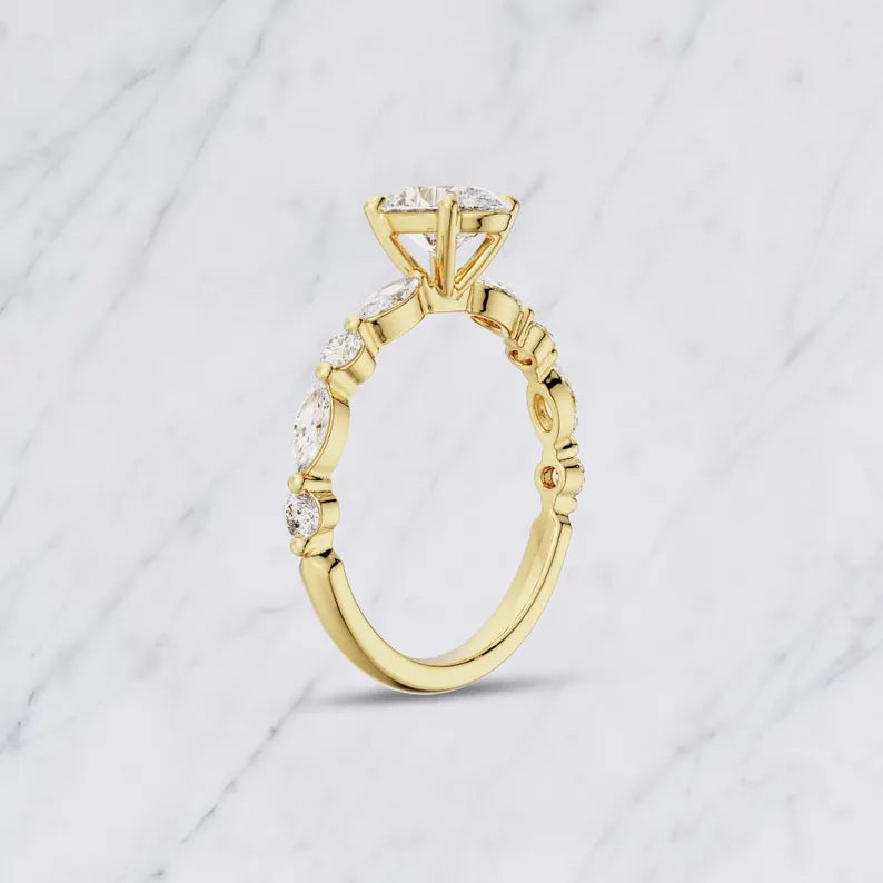 Oval Side Stone Engagement Ring With Moissanite And Diamond Accents
