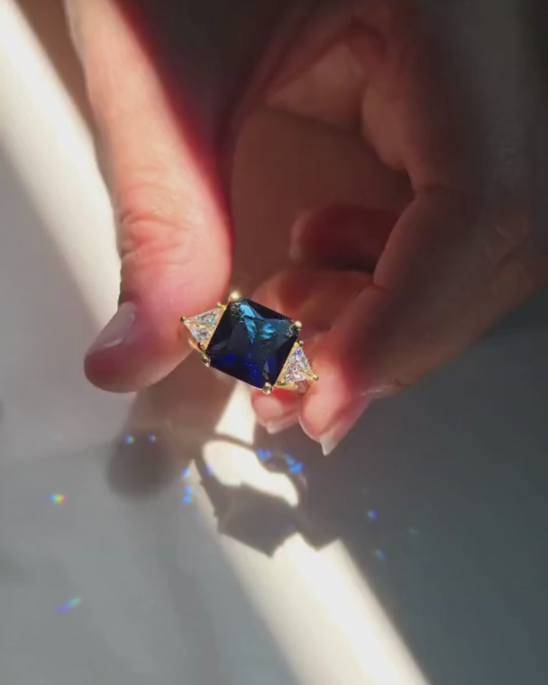 Princess Cut Three Stone Sapphire Ring with Trillion Side Stones
