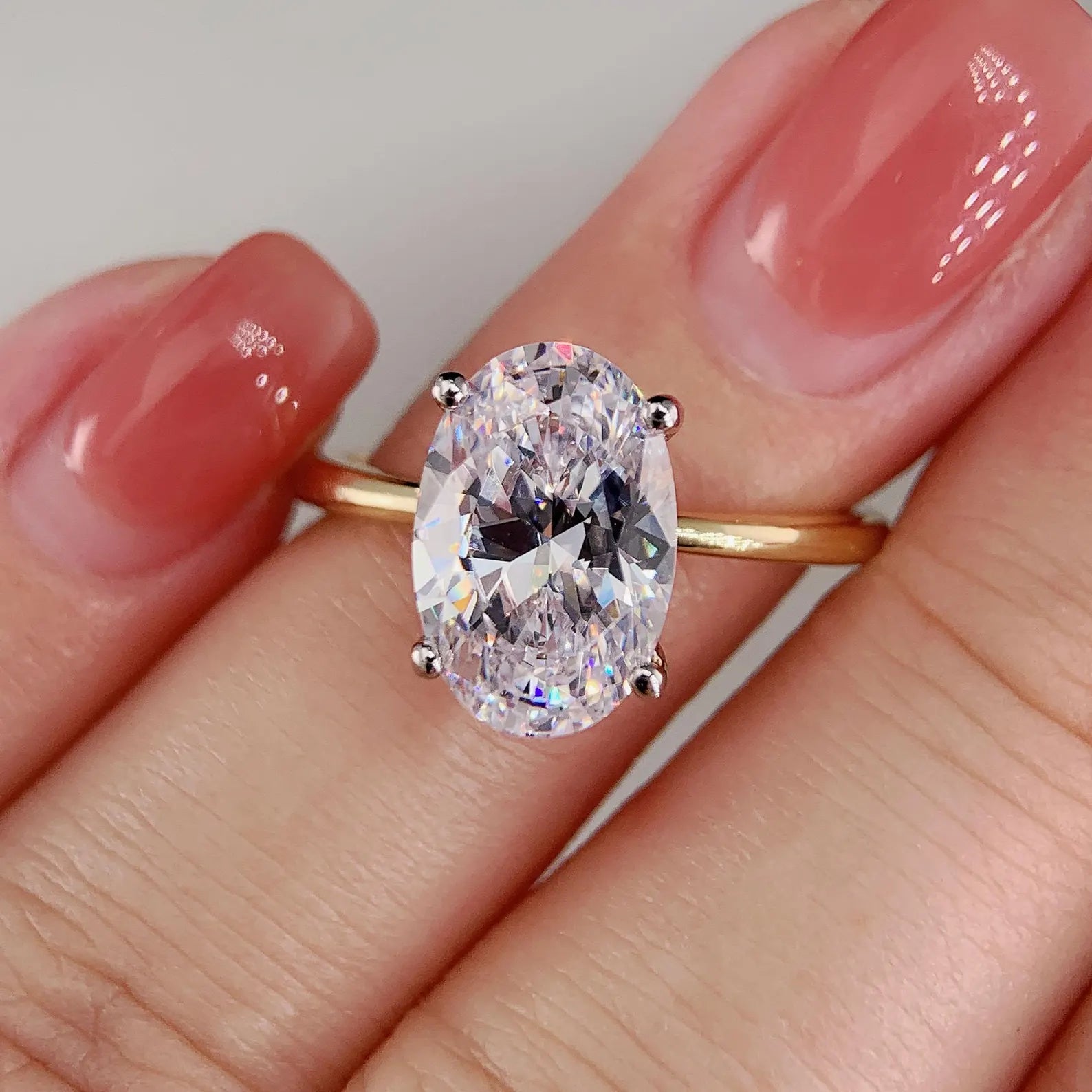 Custom Oval Cut Engagement Ring In Yellow Gold Featuring Diamond Or Moissanite