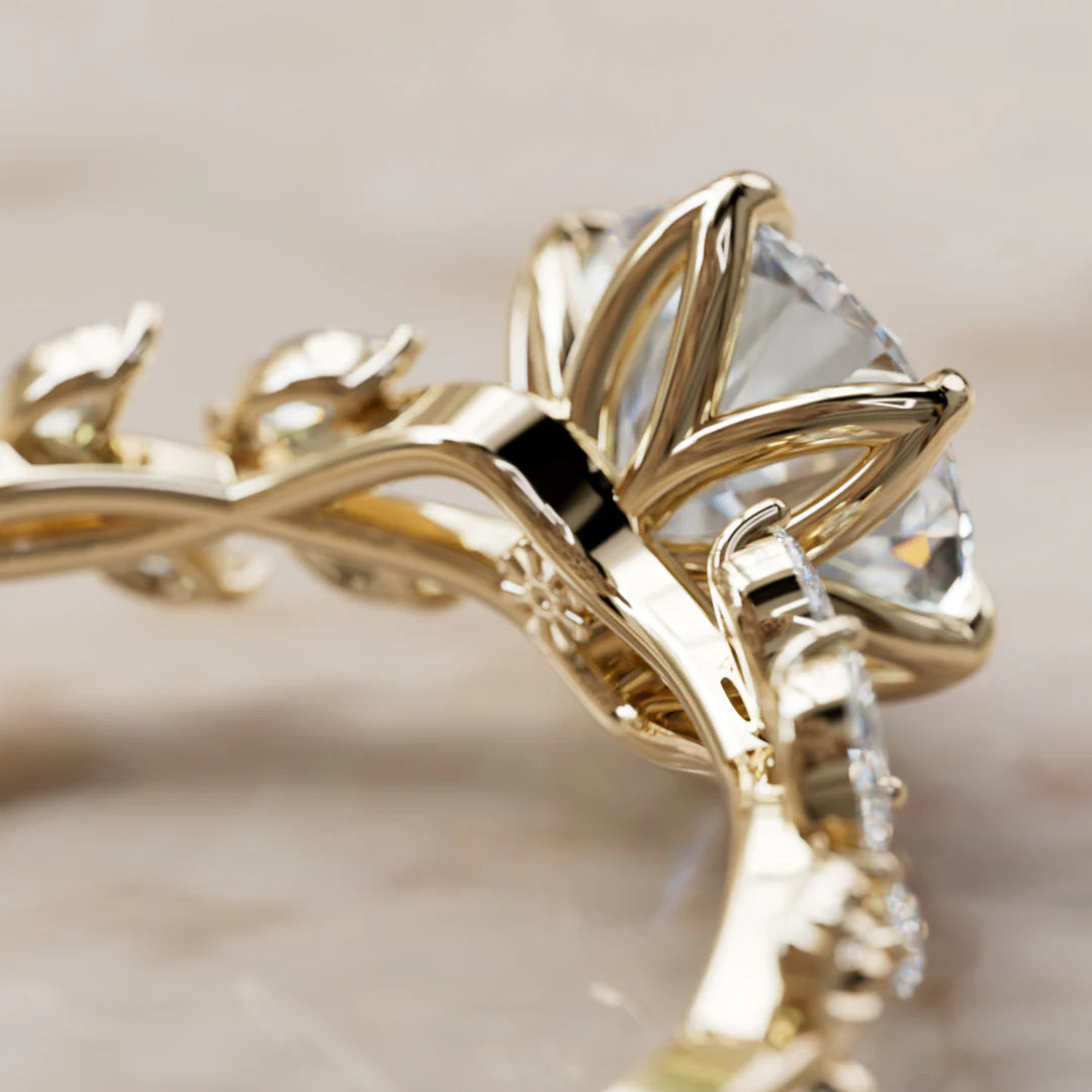 Round Cut Engagement Ring With Marquise Diamond Side Accents
