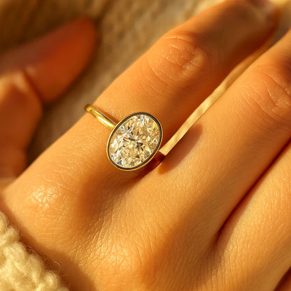 Weddings Bands for Her Brilliant Oval Diamond Bezel Setting Gold Rings
