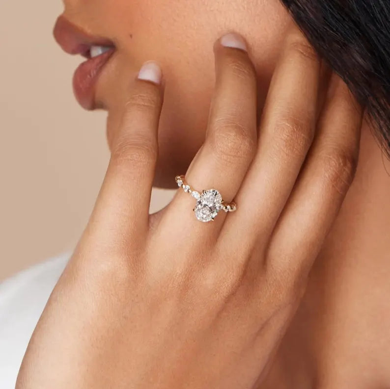 Oval Ring With Side Stones Featuring Lab Grown Diamond And 4 Claw Prong Setting
